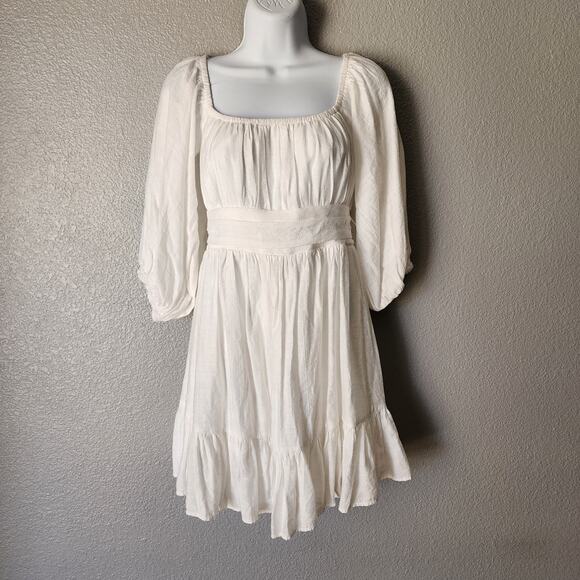 Saints + Secrets Puff Sleeve Open Back Bow White Ruffle Dress - Picture 2 of 9